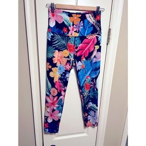 Beyond Yoga leggings with a bright tropical print